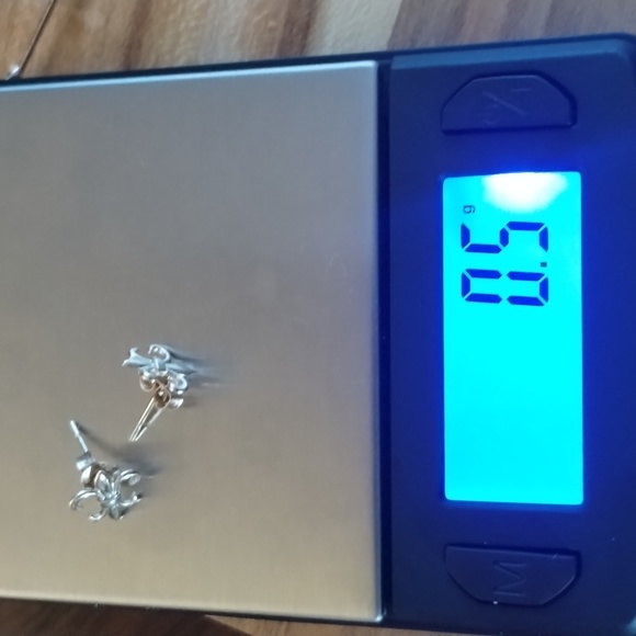 14k Fleur de lis Studs - Picture 2 of 9